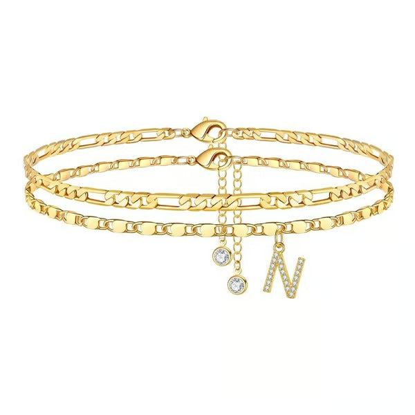 Chaîne de cheville lettres multicouches et réglable | Hypoallergénique, sans nickel ni plomb | Or/argent | 21,5 cm + 5 cm
