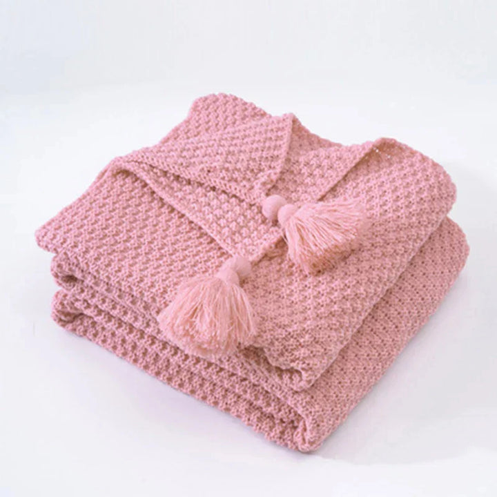 Wolldecke 130 × 160 cm | Gestrickte Kuscheldecke aus 100 % Wolle mit Quasten und dekorativen Kugeln