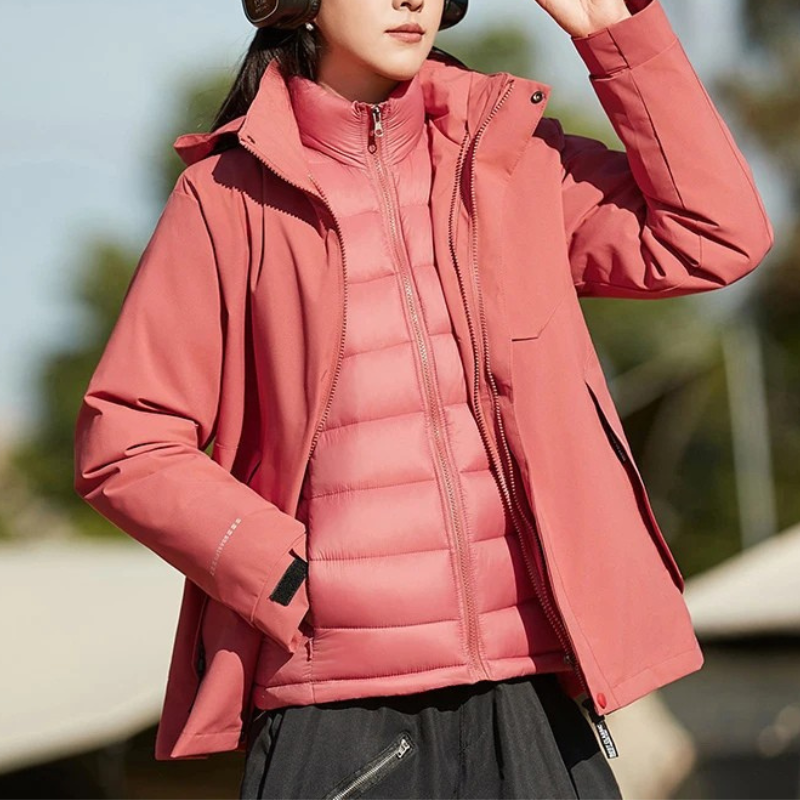Damen Skijacke mit Kapuze | Sportliche Winterjacke mit verstellbarer Kapuze und praktischen Taschen für Ski und Outdoor