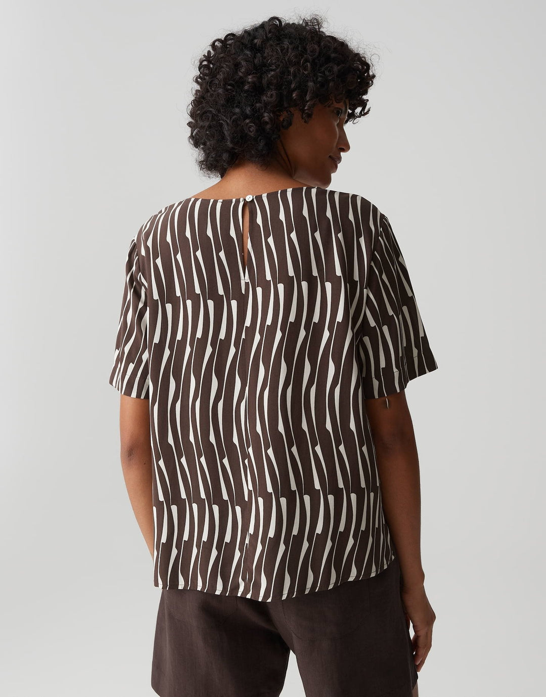 Damen Bluse | Loose-Fit-Bluse mit U-Boot-Ausschnitt, Kurzarm und grafischem Muster