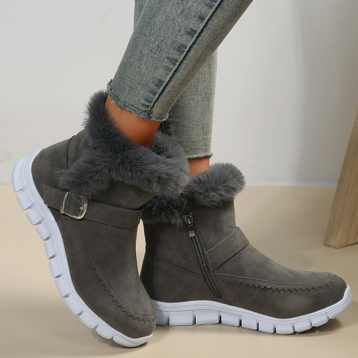 Damen Winterstiefeletten warm gefüttert | Kurzstiefel in Velourslederoptik mit Kunstfellbesatz, Reißverschluss und Profilsohle
