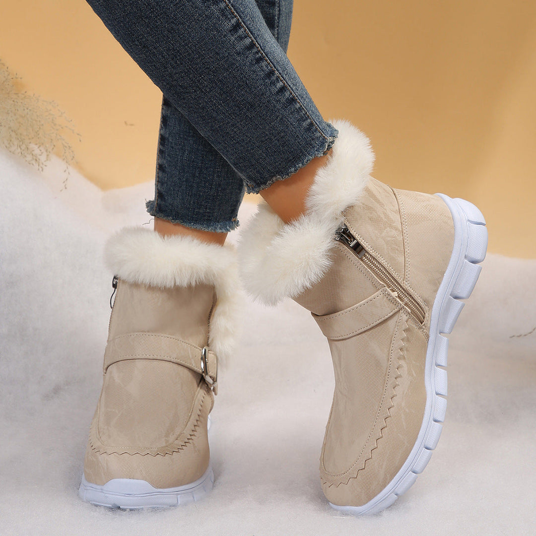 Damen Winterstiefeletten warm gefüttert | Kurzstiefel in Velourslederoptik mit Kunstfellbesatz, Reißverschluss und Profilsohle