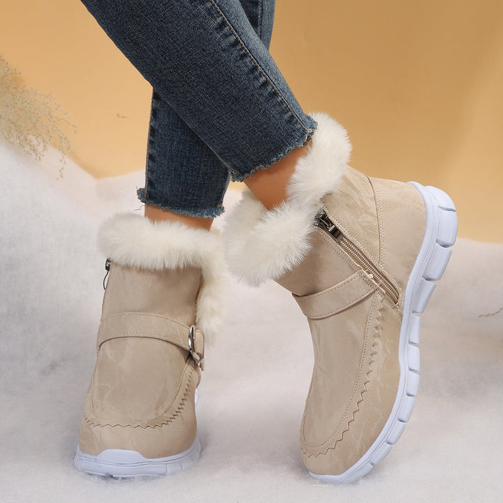 Damen Winterstiefeletten warm gefüttert | Kurzstiefel in Velourslederoptik mit Kunstfellbesatz, Reißverschluss und Profilsohle