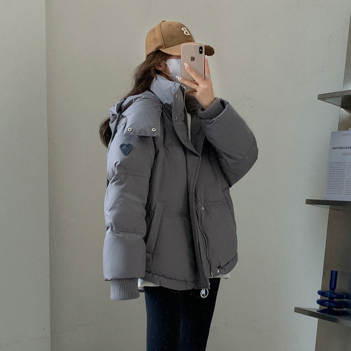 Damen Oversize Steppjacke mit Kapuze | Thermowattierte Winterjacke mit wasserabweisender Oberfläche und Reißverschlusstaschen