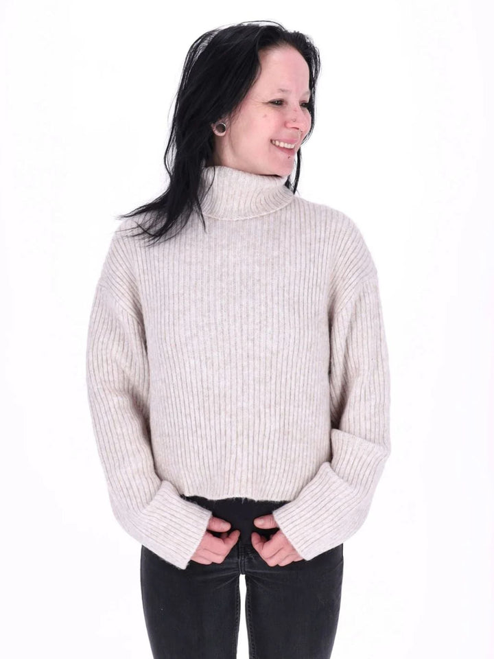 Damen Rollkragenpullover in Beige | Weicher Feinstrickpullover mit hohem Kragen, langen Ärmeln und bequemer Passform für Herbst und Winter
