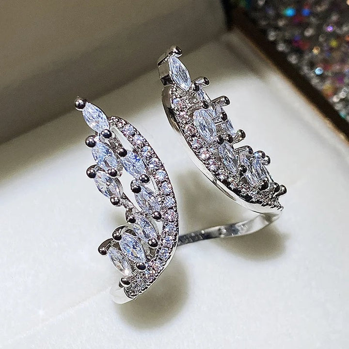 Engelshorn Armreif verstellbar | Flügel-Design mit Zirkonia | Eleganter Schmuck aus Legierung | Für Alltag &amp; Anlass