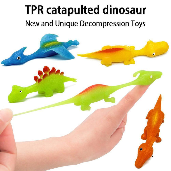 Dinosauruksen heittoliina lelu 5 kpl | Pehmeä TPR-laukaisin tarttuvalla pinnalla | Juhlaherkku sisä- ja ulkokäyttöön | 11,5 cm | Väri satunnainen