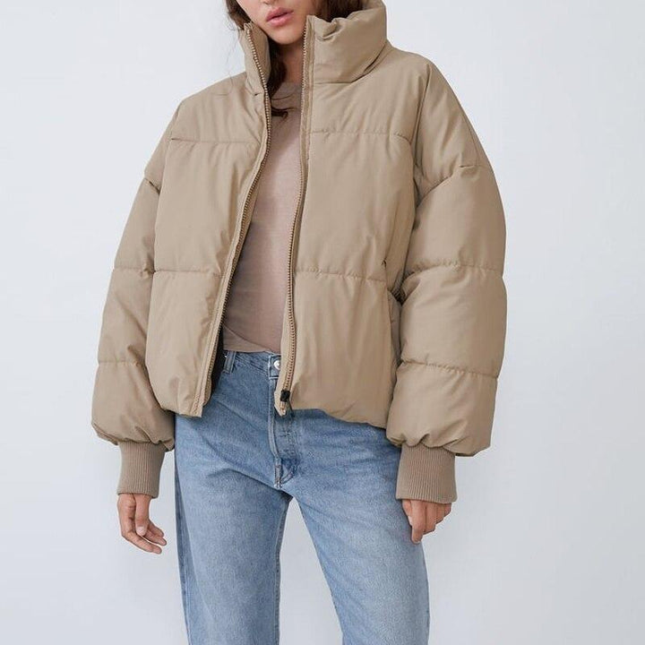 Damen Winterjacke mit hohem Kragen | Gepolsterte wasserabweisende Jacke mit Taschen, Rippbündchen und verstellbarem Saum