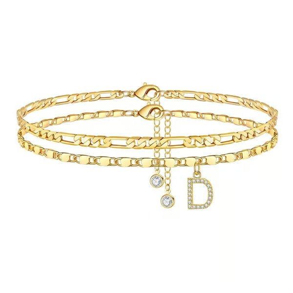 Chaîne de cheville lettres multicouches et réglable | Hypoallergénique, sans nickel ni plomb | Or/argent | 21,5 cm + 5 cm