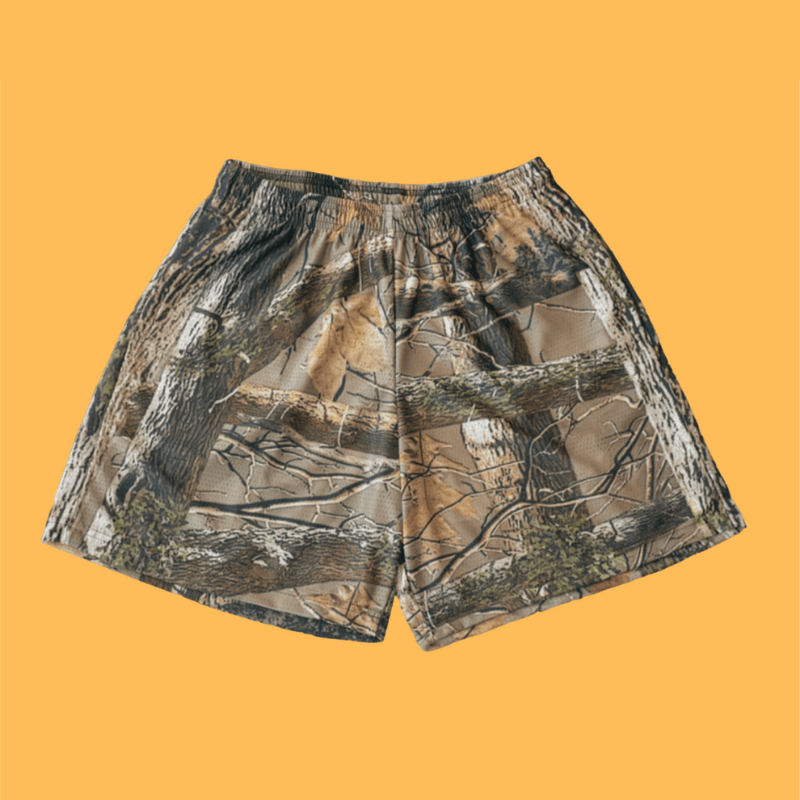 Unisex camo shorts with elastic waistband | Loose fit for summer &amp; leisure | Natural camouflage print | Sizes XS–XL