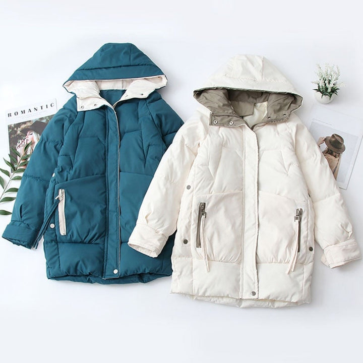 Damen Pufferjacke mit Kapuze | Hüftlange Steppjacke mit Rautensteppung, geradem Schnitt und asymmetrischem Design für Winter