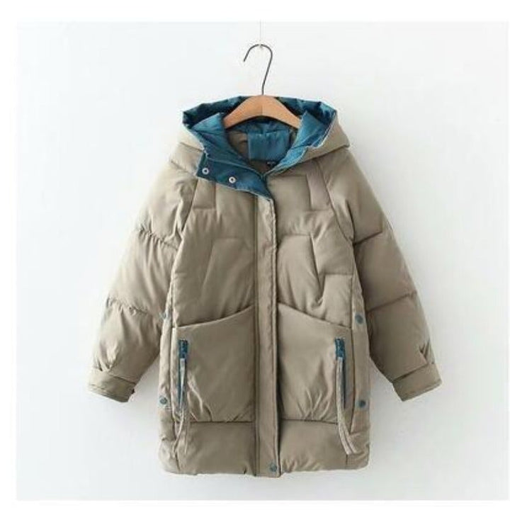 Damen Pufferjacke mit Kapuze | Hüftlange Steppjacke mit Rautensteppung, geradem Schnitt und asymmetrischem Design für Winter